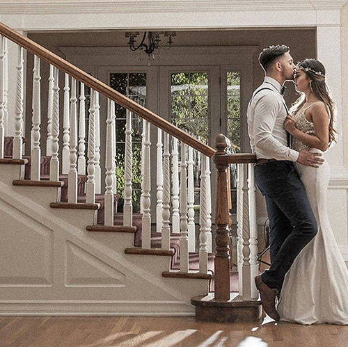 Stonebridge Manor by Wedgewood Weddings Bride and Groom by the Stairs